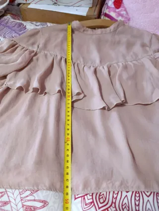 Blusa rosa con volantes