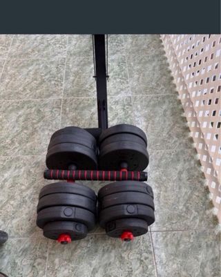 Banco de pesas con mancuernas