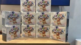 Caja Entrenador Élite Evoluciones Prismáticas Espa