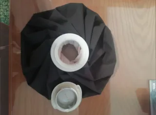 Bolsa de hielo negra con tapa blanca
