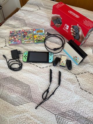 Nintendo Switch con 3 juegos y funda
