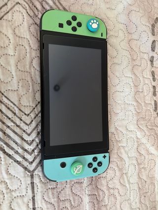 Nintendo Switch con 3 juegos y funda