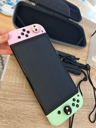 Nintendo Switch OLED con 4 joy-con + accesorios