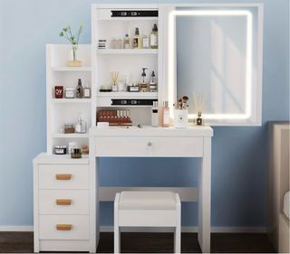 Tocador de maquillaje blanco con espejo