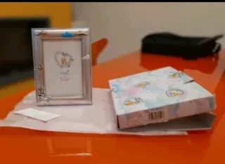 Cornice portafoto Pupi e Pupe