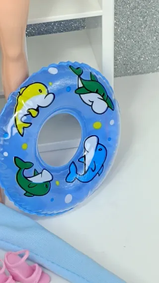 Barbie playa bañador naranja flotador