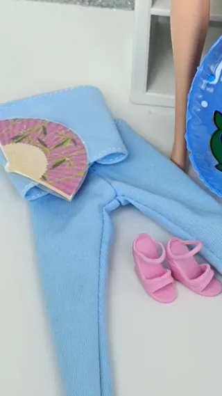 Barbie playa bañador naranja flotador