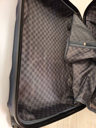 Maleta azul de viaje