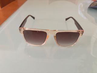 Gafas de sol beige y marrones