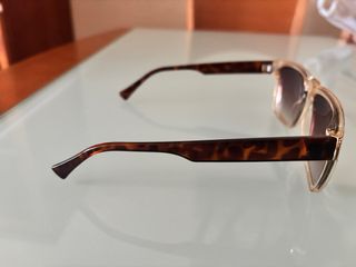 Gafas de sol beige y marrones