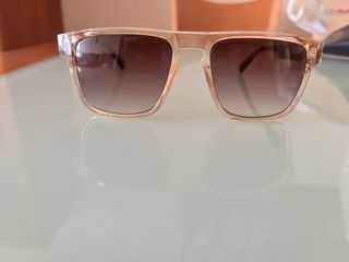 Gafas de sol beige y marrones