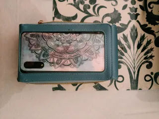 Bolso azul con ventana para móvil