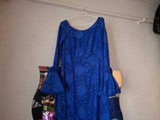 Traje de flamenca azul con volantes