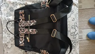 Zaino nero con stampa animalier