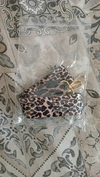 Zaino nero con stampa animalier