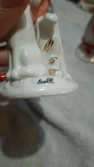 Coppia statuine porcellana ragazzo e ragazza