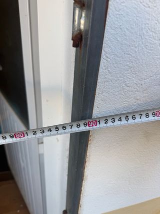 Venta de puerta de aluminio con cierre de tijeraa