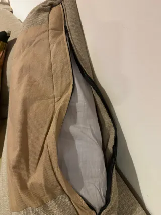 Divano letto beige con penisola e contenitore