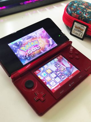 Nintendo 3DS Rossa + Gioco Pokémon + Custodia