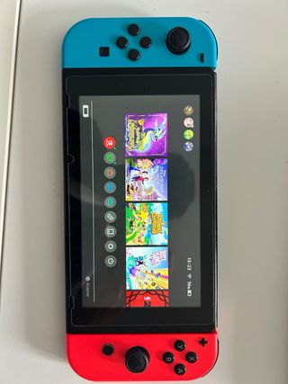 Nintendo Switch con todo incluido funda y cables