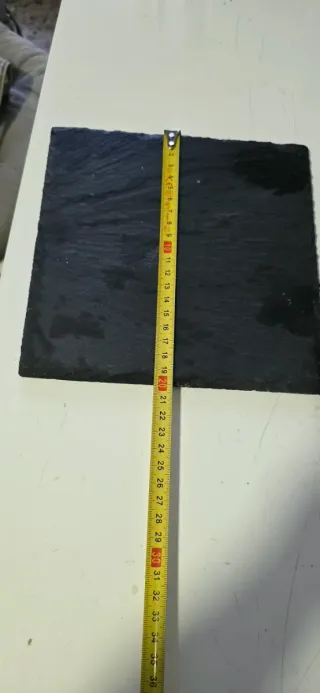 Platos de pizarra redondos y cuadrados