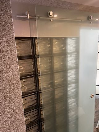 Puerta corredera de cristal