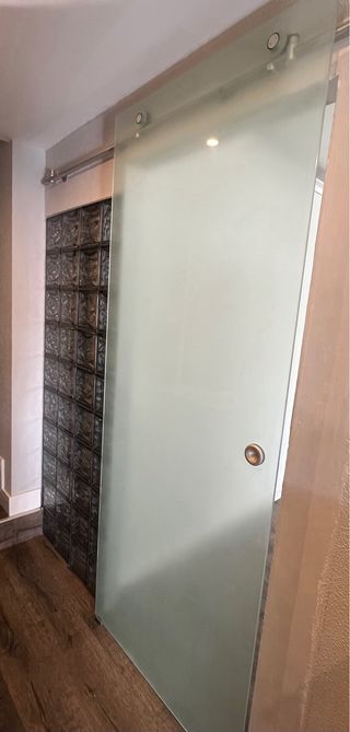 Puerta corredera de cristal