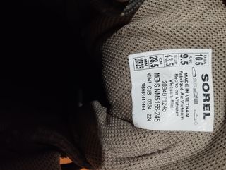 Botas de montaña Sorel negras y grises