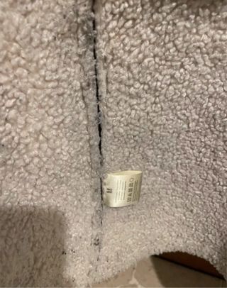 Giacca in pelle nera con pelliccia