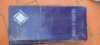 Muñeca de porcelana antigua vestida de azul