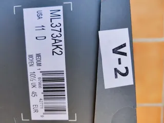 Zapatillas New Balance Gris y Blanco