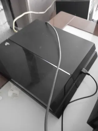 PS4 + 4 Juegos y mando cambia de colores