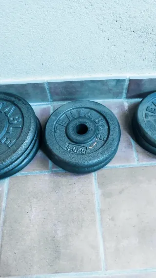Mancuernas y discos de pesas