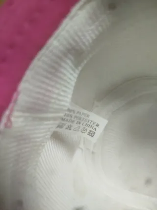 Sombrero de paja beige con cinta rosa