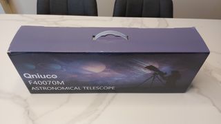 Telescopio Qniuco con trípode