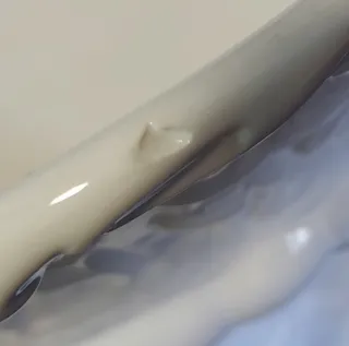 Centro de mesa de porcelana con querubines