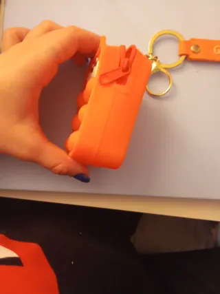 Monedero Naranja Gato Pop-it Suerte