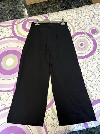 Pantalón de pinzas negro mujer
