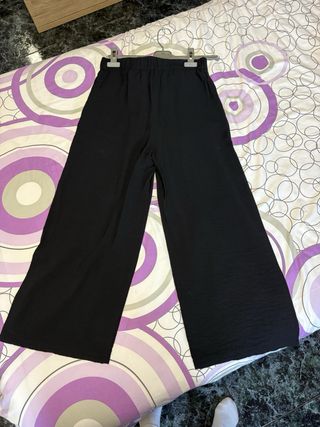 Pantalón de pinzas negro mujer