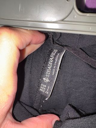 Pantalón de pinzas negro mujer