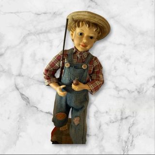 Figura niño pescador con caña
