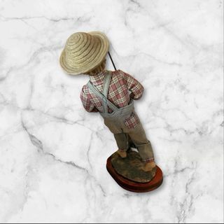 Figura niño pescador con caña