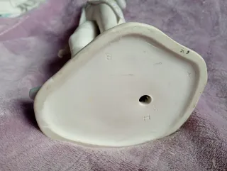 Figura de porcelana hombre elegante