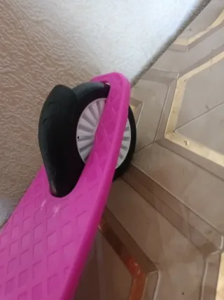 Patinete infantil con mochila