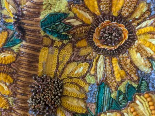 Bolso Zara con abalorios y flores