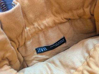 Bolso Zara con abalorios y flores