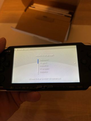 PSP Slim 3004 Piano Black con cámara