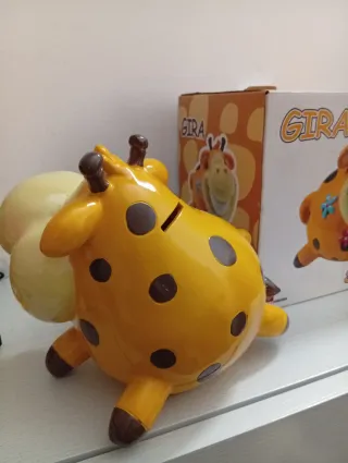 Salvadanaio Gira in ceramica