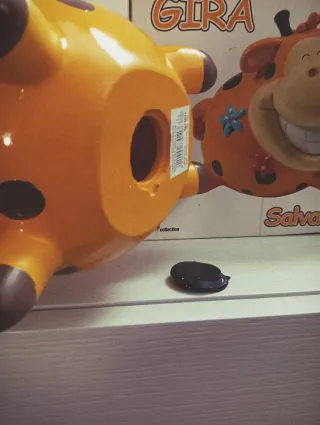 Salvadanaio Gira in ceramica