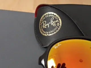 Gafas de sol Ray-Ban pasta negra lentes naranja